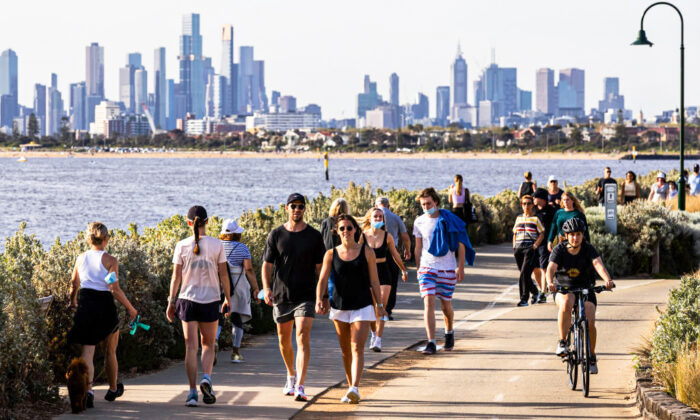 People are seen exercising in Brighton in Melbourne, Australia, on Oct. 20, 2021. (Daniel Pockett/Getty Images)