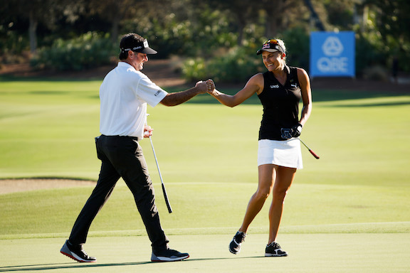 NAPLES, FLORIDA - DECEMBER 11: Bubba Watson of the United States and Lexi Thompson of the United States celebrate their birdie on the 14th green during the second round of the QBE Shootout at Tiburon Golf Club in Naples, Florida, on December 11, 2021. (Cliff Hawkins/Getty Images)