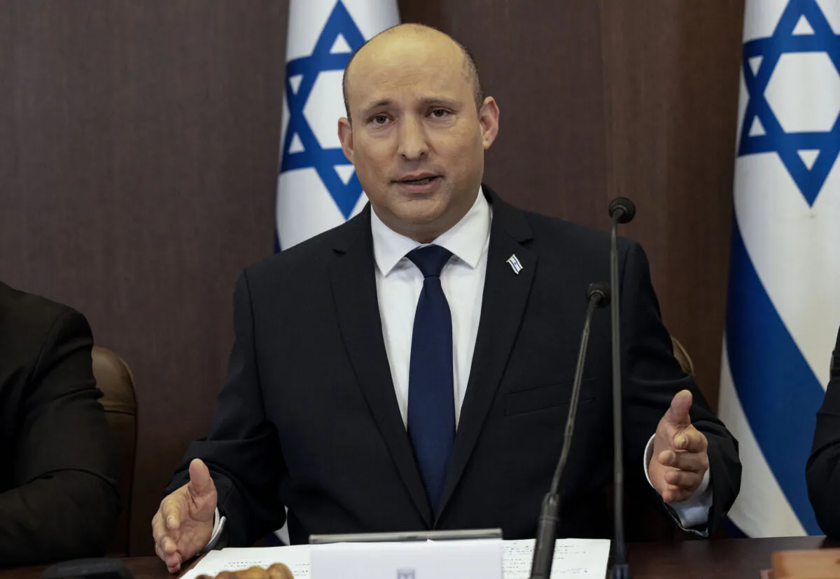 Israeli Prime Minister Naftali Bennett chairs the weekly cabinet meeting in Jerusalem, on Dec. 12, 2021. (Tsafrir Abayov/AP Photo)