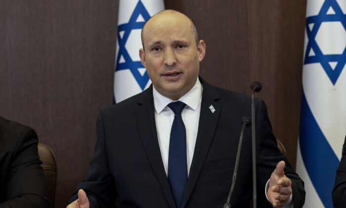 Israeli Prime Minister Naftali Bennett chairs the weekly cabinet meeting in Jerusalem, on Dec. 12, 2021. (Tsafrir Abayov/AP Photo)