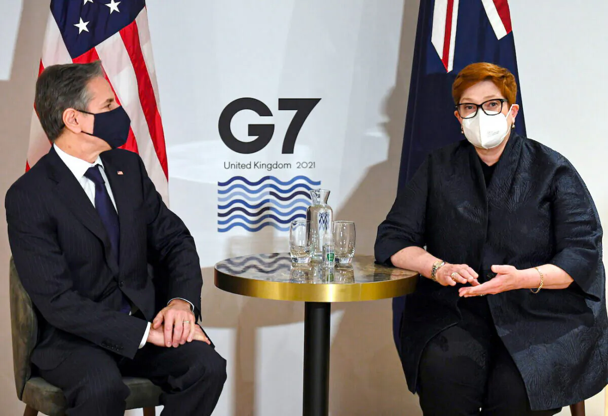 U.S. Secretary of State Antony Blinken and Australia's Foreign Minister Marise Payne hold a bilateral meeting on the first day of the G-7 Foreign Ministers Summit in Liverpool, UK, on Dec. 11, 2021. (Olivier Douliery/Pool via Reuters)