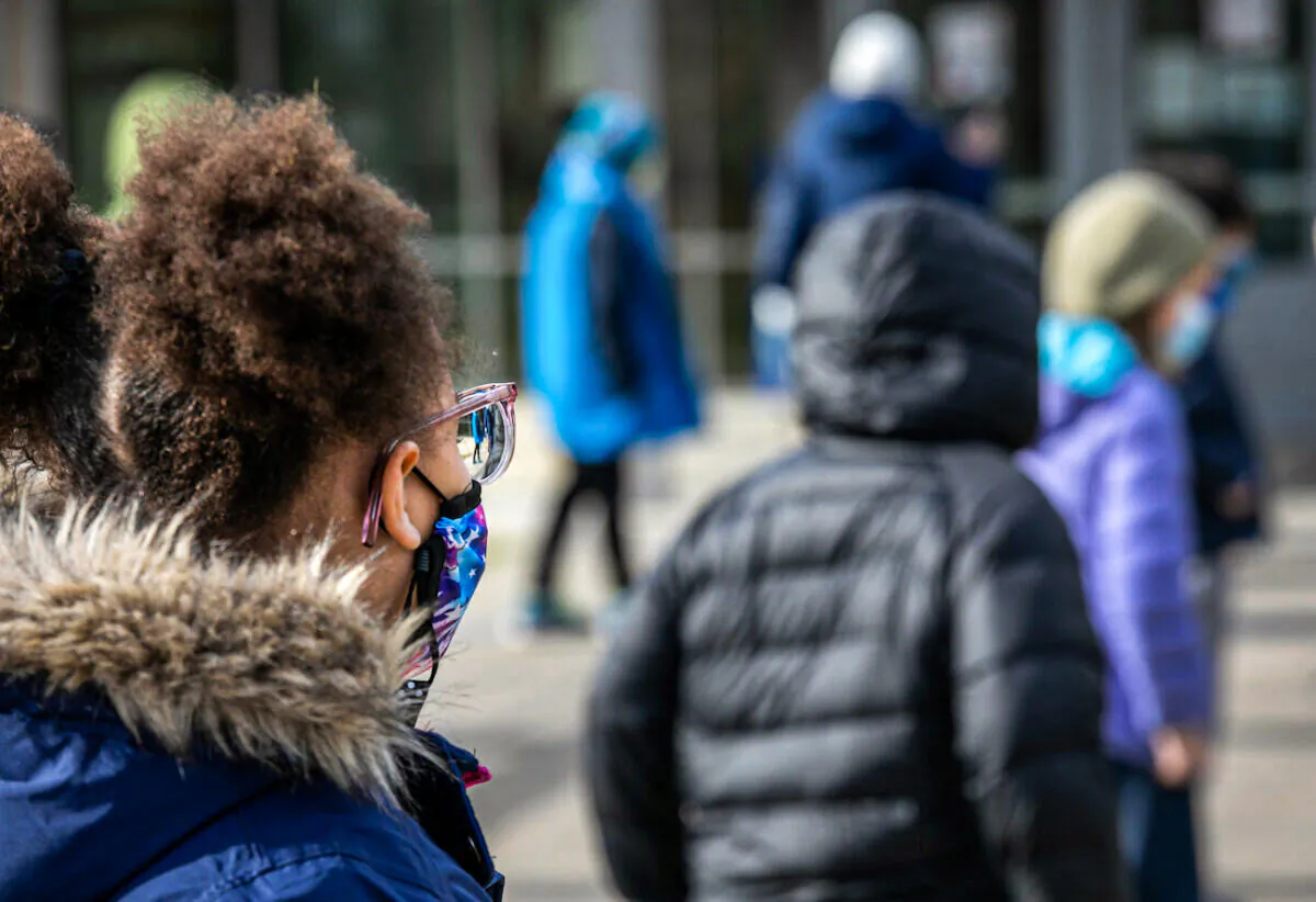 A child wears a mask at Rogers International School in Stamford, Conn., on Nov.19, 2020. (John Moore/Getty Images)
