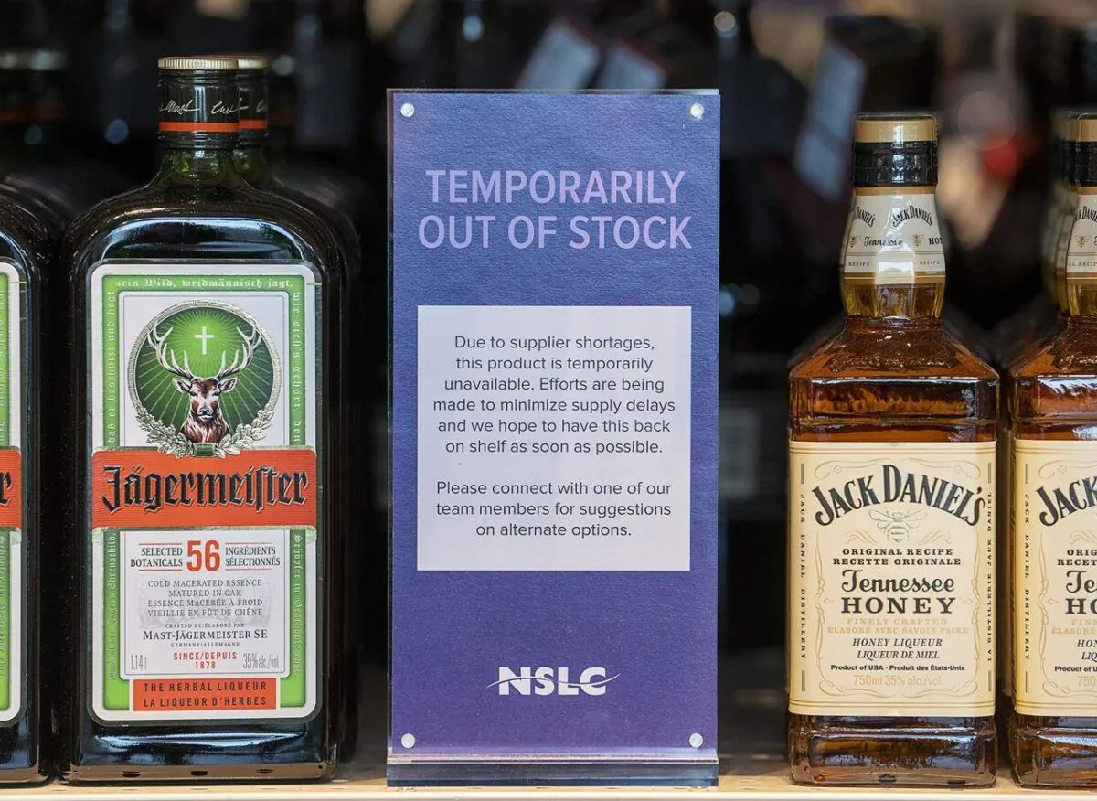 Signage reflecting a product shortage is displayed at the Nova Scotia Liquor Corp. in Halifax, Dec. 10, 2021. (The Canadian Press/Andrew Vaughan)
