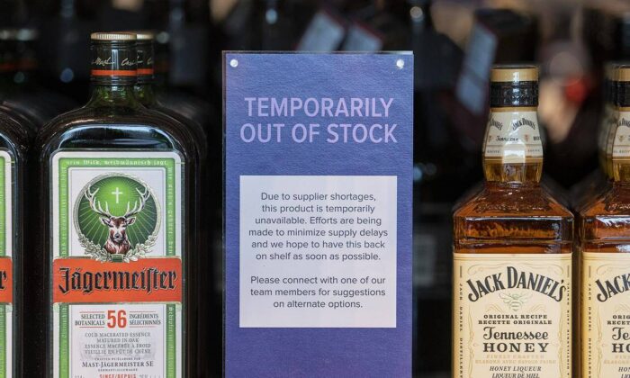 Signage reflecting a product shortage is displayed at the Nova Scotia Liquor Corp. in Halifax, Dec. 10, 2021. (The Canadian Press/Andrew Vaughan)