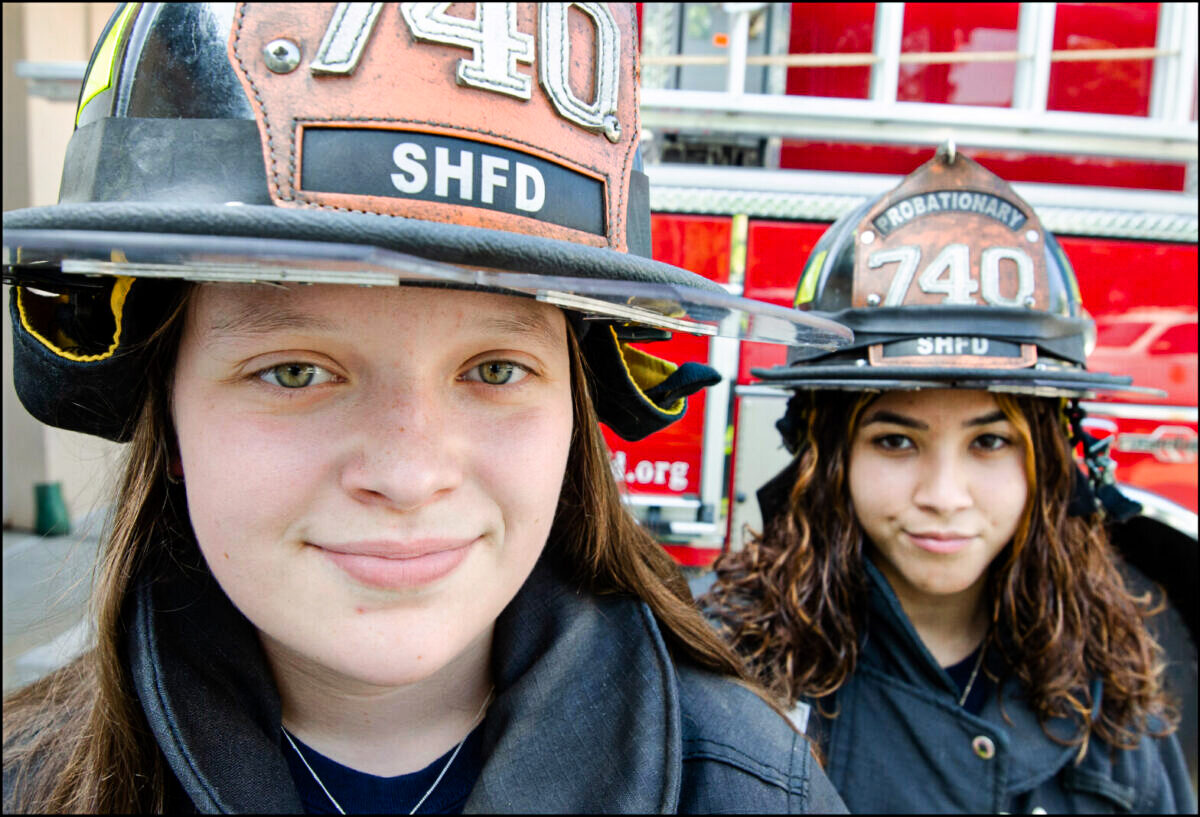Firefighters-in-training, or "probies," Kelli Maher (L) and Kiara Santos, of the South Hempstead Fire Department in Long Island, N.Y. (Dave Paone)