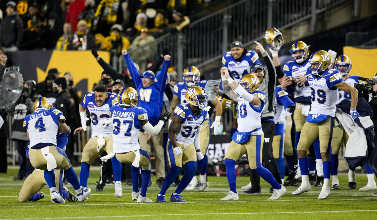 The Winnipeg Blue Bombers celebrate their victory against the Hamilton Tiger-Cats in the 108th CFL Grey Cup in Hamilton on Dec. 12, 2021. (The Canadian Press/Ryan Remiorz)
