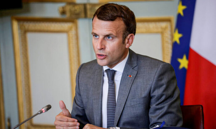 French President Emmanuel Macron delivers his statement at the end of the 5th France-Oceania Summit, held via video-conference, at the Elysee Palace in Paris, France, on July 19, 2021. (Yoan Valat/Pool via Reuters)