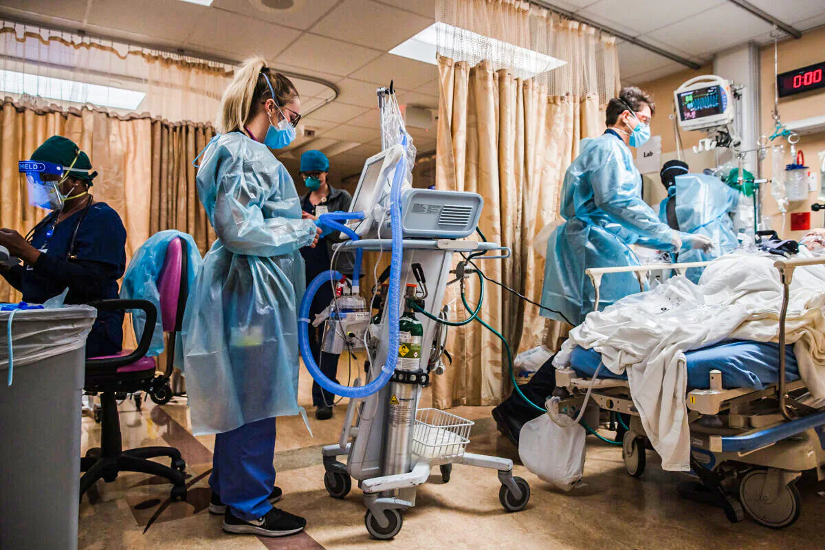 Health care workers are seen in a recent file photo. (Ariana Drehsler/AFP via Getty Images)