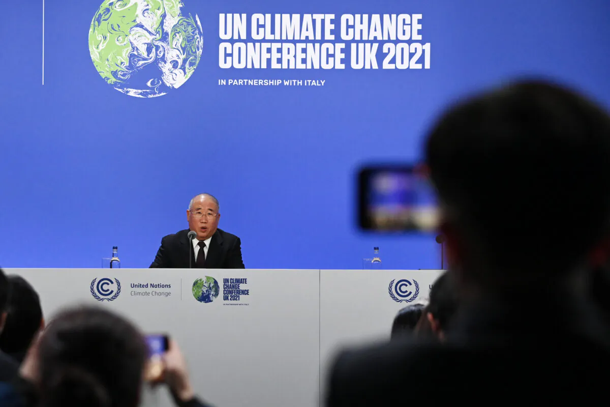 China's special climate envoy, Xie Zhenhua, speaks during a joint China and US statement on a declaration enhancing climate action in the 2020s on Nov. 10, 2021 in Glasgow, Scotland. )Jeff J Mitchell/Getty Images)