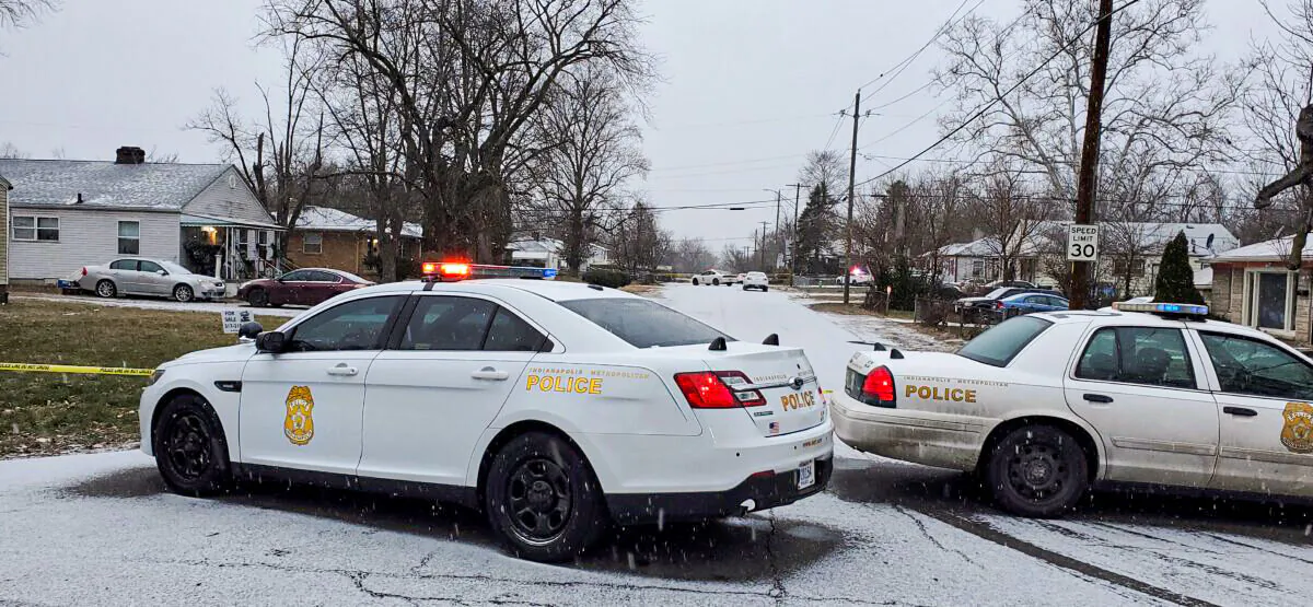 Indianapolis Metropolitan Police Department work the scene in Indianapolis, Ind., on Jan. 24, 2021. (Justin L. Mack/The Indianapolis Star via AP)
