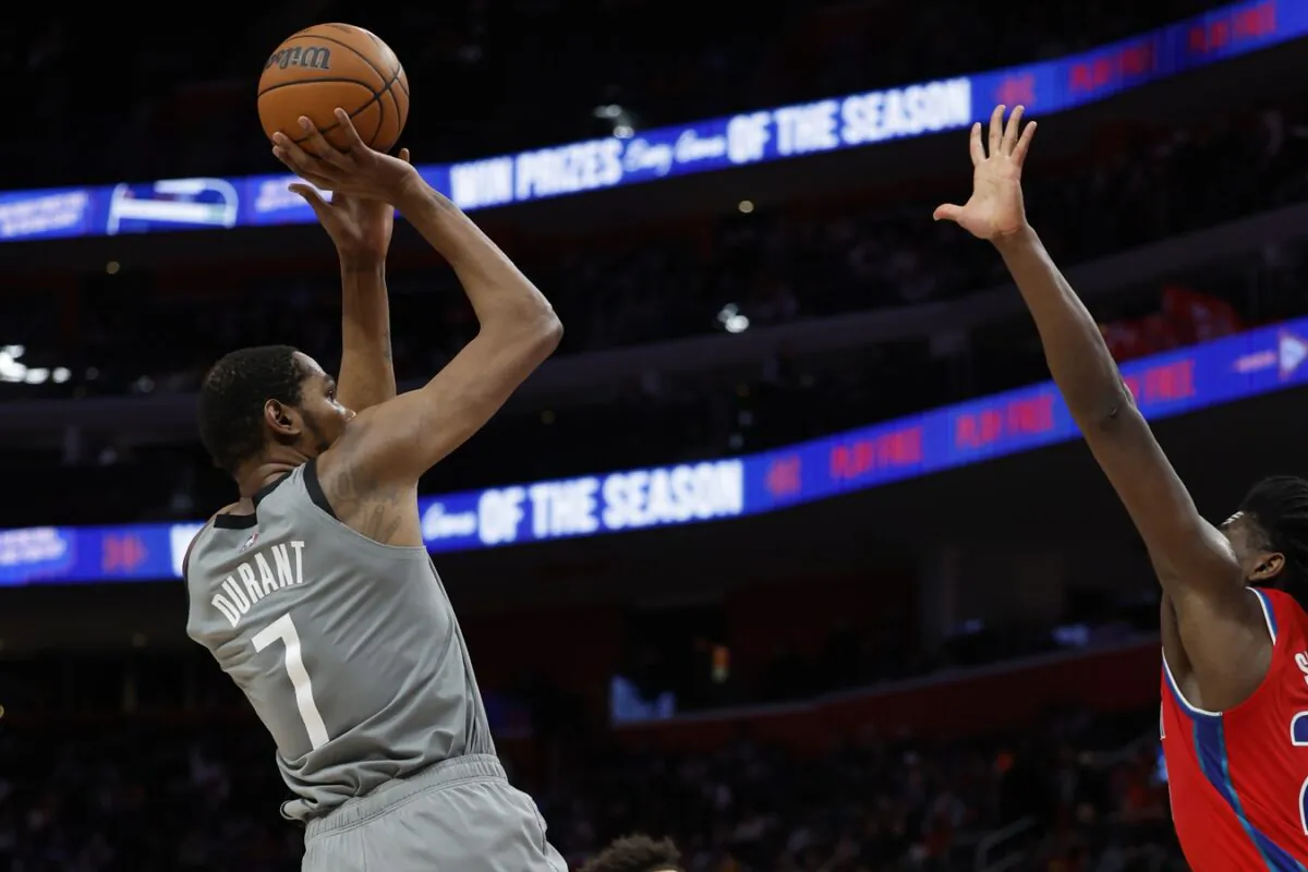 Brooklyn Nets forward Kevin Durant (7) shoots in the first half against the Detroit Pistons at Little Caesars Arena in Detroit, on Dec. 12, 2021. (Chris Jones/USA TODAY Sports via Field Level Media)