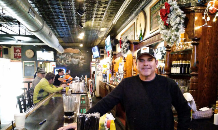 John Granzier, owner of Merry Arts Pub and Grill, the oldest bar in Lakewood, Ohio, said on Dec. 10 that he'd be glad to place a sports betting kiosk in his suburban Clevleand establishment. Ohio's legislature passed House Bill 29 and Gov. Mike DeWine next will review it. The state could make betting licenses available to eligible businesses as early as April, 2022. (Photo by Michael Sakal/Epoch Times). 