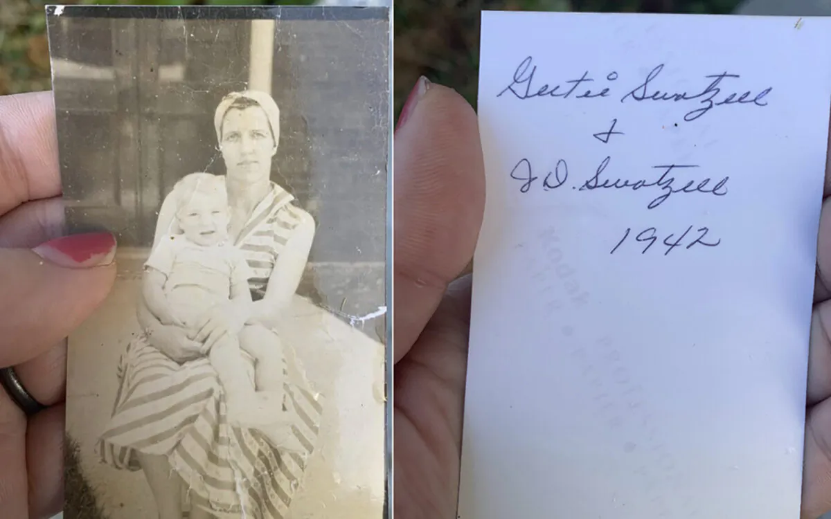 This photo combo shows Katie Posten holding the front and back of a photograph she found stuck to her car's windshield in New Albany, Ind., on Dec. 11, 2021.   The photo is from a tornado-damaged home in Kentucky that landed almost 130 miles away in Indiana. (Katie Posten via AP).