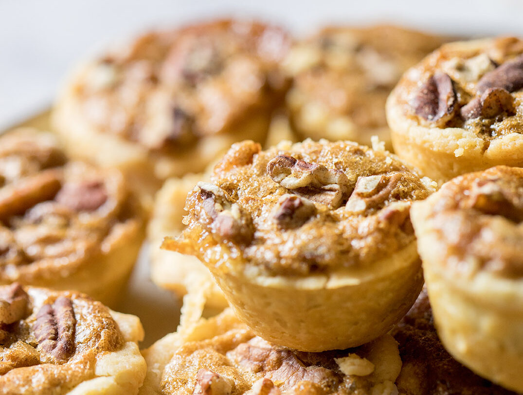 These pecan tassies are pecan pies in bite-size cookie form. (Kate Blohm)