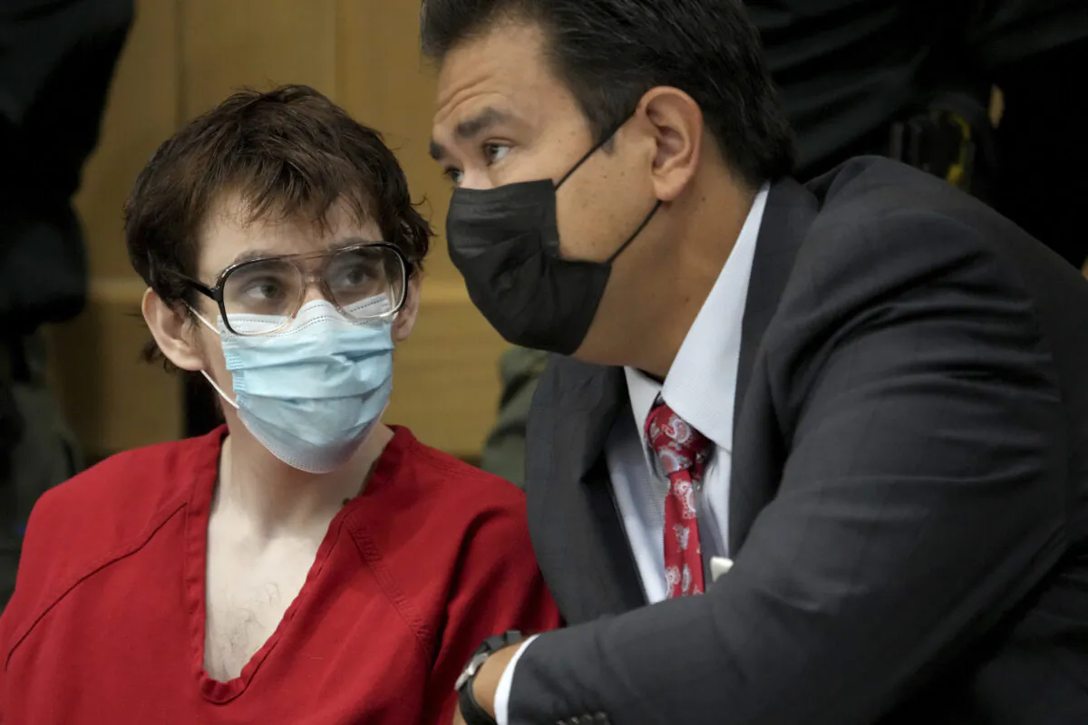 Marjory Stoneman Douglas High School shooter Nikolas Cruz (L) is shown with defense attorney David Wheeler during a hearing at the Broward County Courthouse in Fort Lauderdale, Fla. on Nov. 15, 2021. (Amy Beth Bennett/South Florida Sun Sentinel via AP, Pool)