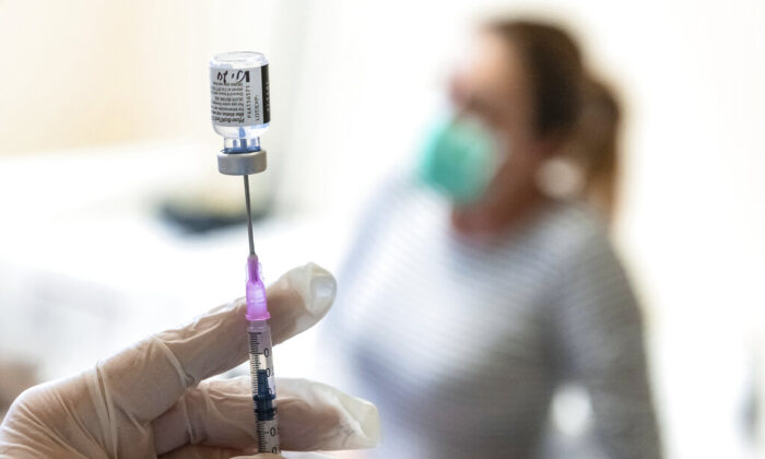 A nurse prepares a dose of Pfizer COVID-19 vaccine to be injected at the Andras Josa Teaching Hospital in Nyiregyhaza, Hungary, Jan. 24, 2021. (Attila Balazs/MTI via AP)