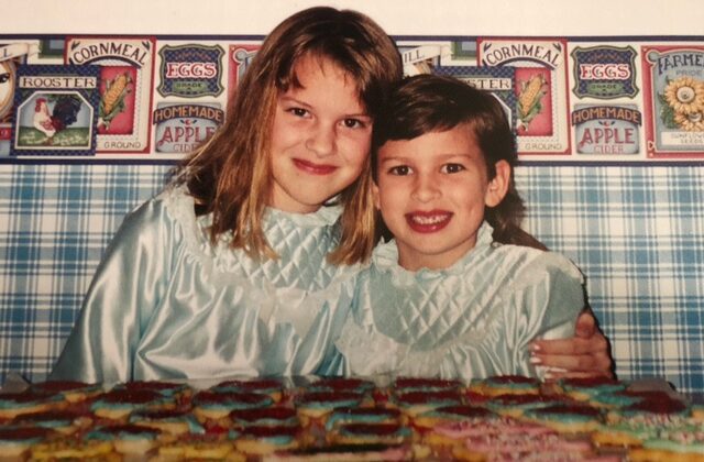 Kim Sutter's daughters, Amber and Heather, when they were young, with a fresh batch of Grandma Geisler's Christmas cookies. (Courtesy of Kim Sutter)