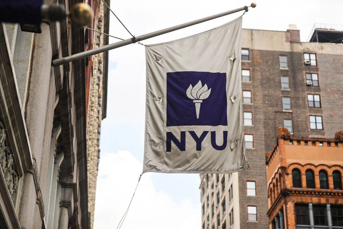 A New York University (NYU) flag flies outside the NYU business school in New York on Aug. 25, 2020. (Spencer Platt/Getty Images)