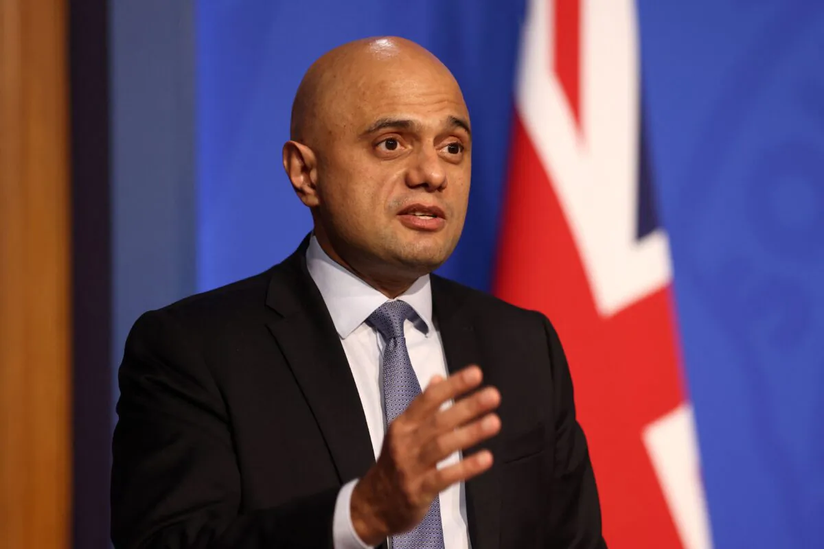 Britain's Health Secretary Sajid Javid speaks to reporters at Downing Street in London in a file photograph. (Tom Nicholson/Pool/AFP via Getty Images)