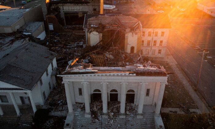 The First United Methodist Church is seen destroyed at sunrise in the aftermath of a tornado in Mayfield, Ky., in this picture taken with a drone, on Dec. 13, 2021. (Adrees Latif/Reuters)