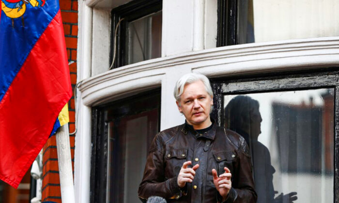 WikiLeaks founder Julian Assange speaks on the balcony of the Embassy of Ecuador in London, on May 19, 2017. (Neil Hall/Reuters)