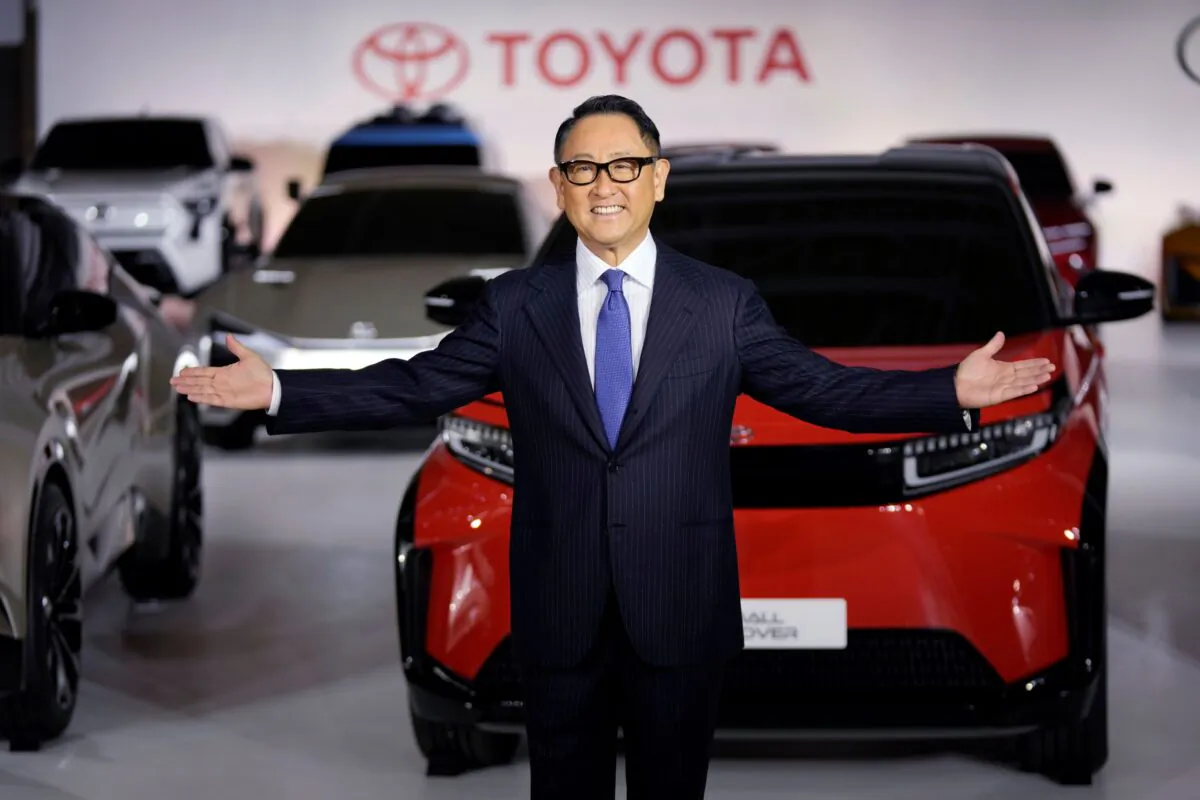 Toyota Motor Corp. President Akio Toyoda gestures for photographers during a press conference regarding battery EV strategies, in Tokyo, Japan, on Dec. 14, 2021. (Eugene Hoshiko/AP Photo)