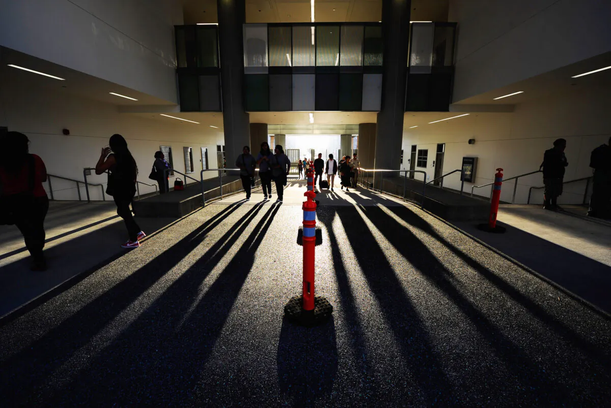 In this file photo, students arrive at school in Los Angeles on Sept. 13, 2010. (Kevork Djansezian/Getty Images)