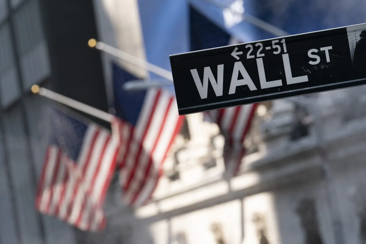 A sign for Wall Street hangs in front of the New York Stock Exchange in New York City, on July 8, 2021. (Mark Lennihan/AP Photo)
