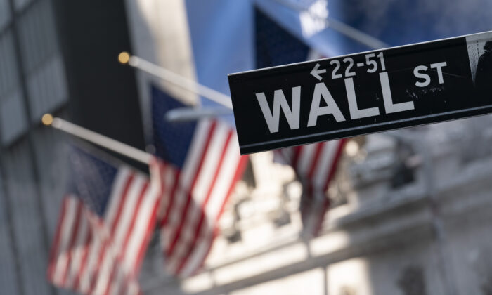 A sign for Wall Street hangs in front of the New York Stock Exchange in New York City, on July 8, 2021. (Mark Lennihan/AP Photo)
