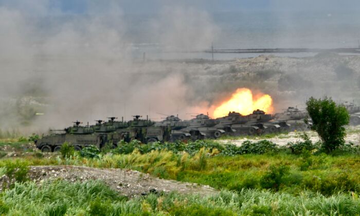 U.S.-made M60A3 tanks fire artillery during the annual Han Kuang military drills in Taichung, Taiwan, on July 16, 2020. (SAM YEH/AFP via Getty Images)