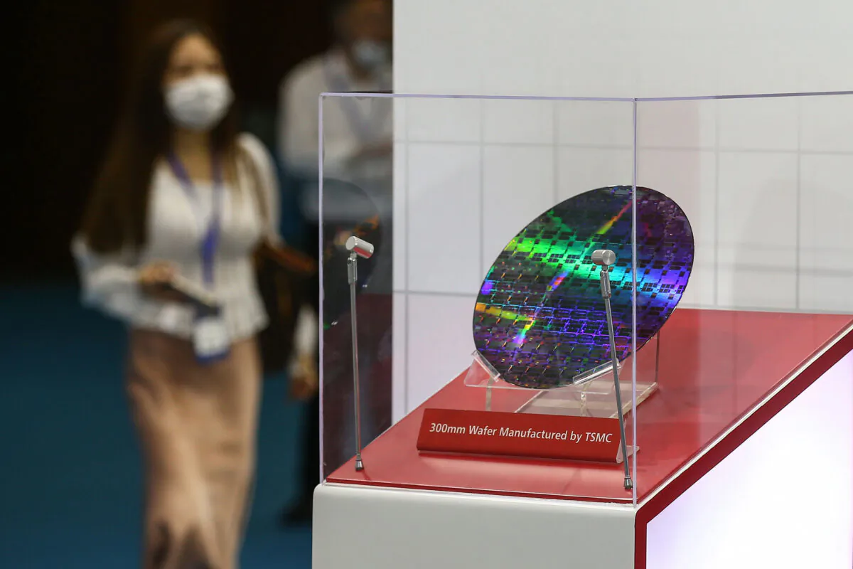 A chip by Taiwan Semiconductor Manufacturing Company (TSMC) on display at the 2020 World Semiconductor Conference in Nanjing in China's eastern Jiangsu Province on Aug. 26, 2020. (STR/AFP via Getty Images)