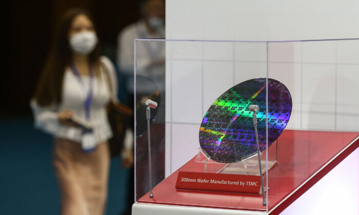 A chip by Taiwan Semiconductor Manufacturing Company (TSMC) on display at the 2020 World Semiconductor Conference in Nanjing in China's eastern Jiangsu Province on Aug. 26, 2020. (STR/AFP via Getty Images)
