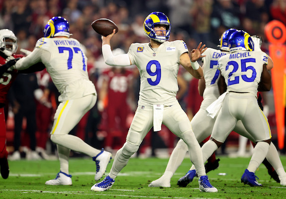 Matthew Stafford #9 of the Los Angeles Rams throws the ball in the first quarter of the game against the Arizona Cardinals at State Farm Stadium in Glendale, Ariz., on Dec. 13, 2021. (Christian Petersen/Getty Images)