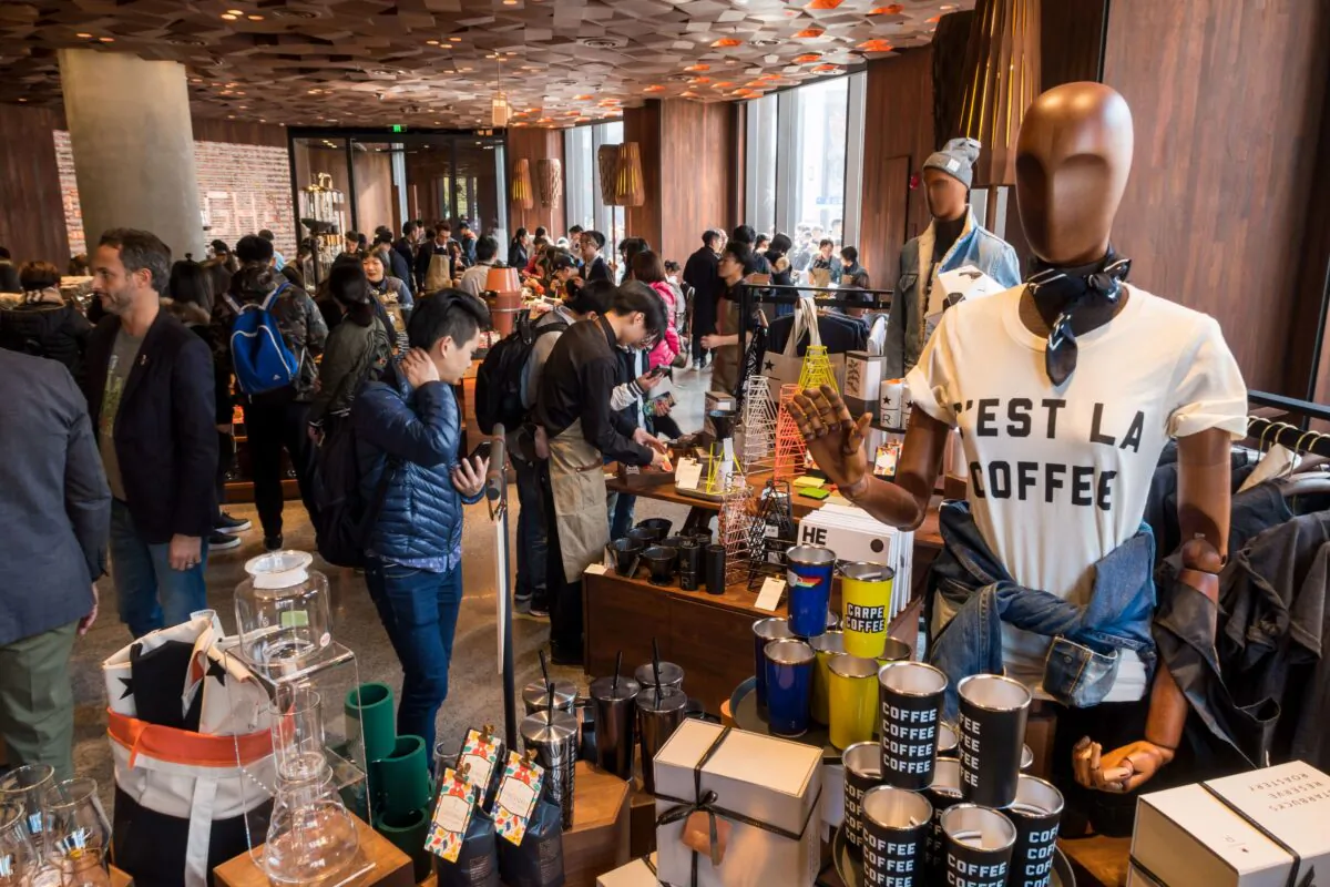 Visitors wait for their coffee at the Starbucks Reserve Roastery outlet in Shanghai, China, on Dec. 6, 2017. (-/AFP via Getty Images)