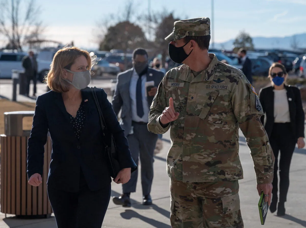 Deputy Secretary of Defense Kathleen H. Hicks speaks with Space Training and Readiness Command Deputy Commander Brig. Gen. Todd Moore during a recent trip to Schriever Space Force Base, Colo., on Dec. 13, 2021.  (DoD/U.S. Air Force Staff Sgt. Brittany A. Chase)