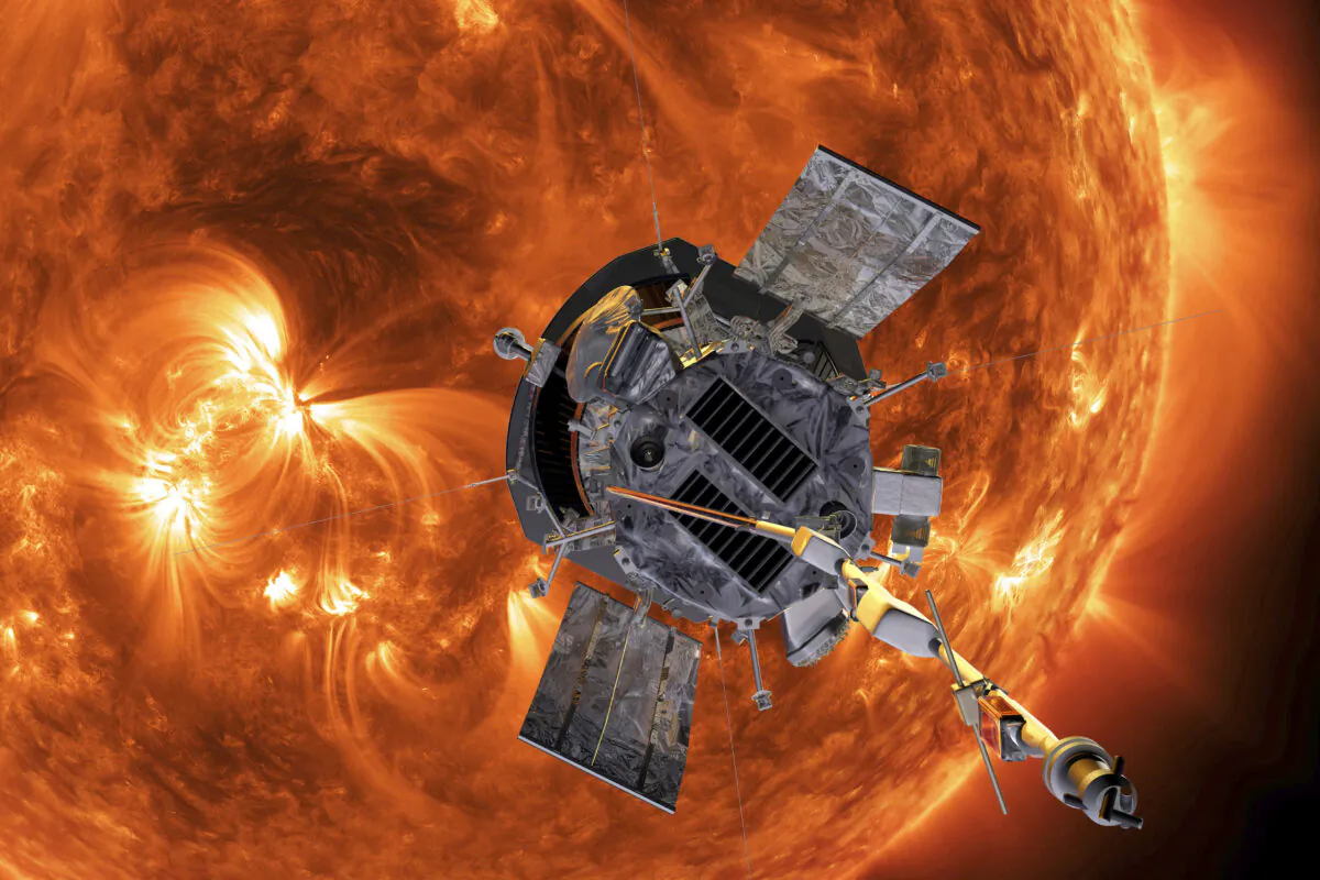 A NASA photo shows an artist's rendering of the Parker Solar Probe approaching the Sun, on Dec. 14, 2021. (Steve Gribben/Johns Hopkins APL/NASA via AP)