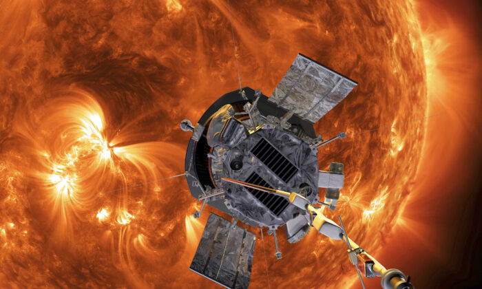 A NASA photo shows an artist's rendering of the Parker Solar Probe approaching the Sun, on Dec. 14, 2021. (Steve Gribben/Johns Hopkins APL/NASA via AP)