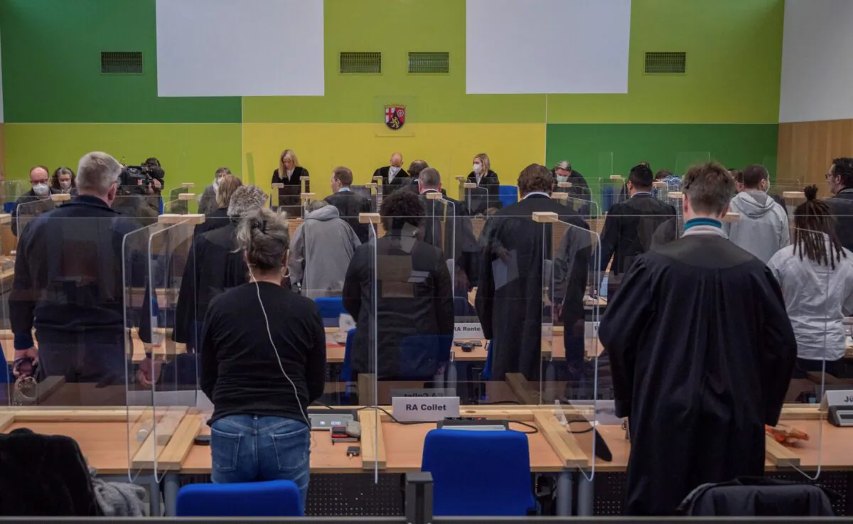 Presiding judge G'nther Koehler announces the verdicts in the so-called Cyberbunker trial at the regional court in Trier, Germany, on Dec. 13, 2021. (Harald Tittel/dpa via AP)
