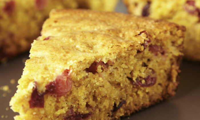 Fresh and dried cranberries dot this delicious cornbread. (Erica Allen/TNS)