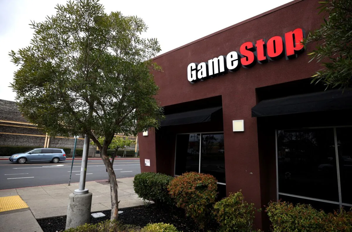 A sign is posted on the exterior of a GameStop store in Emeryville, Calif., on March 10, 2021. (Justin Sullivan/Getty Images)