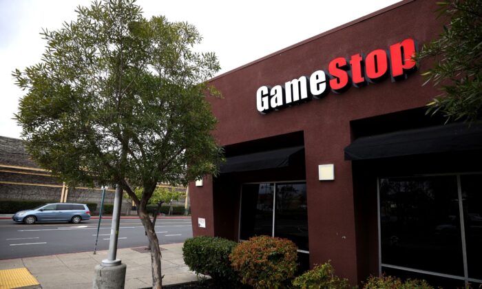 A sign is posted on the exterior of a GameStop store in Emeryville, Calif., on March 10, 2021. (Justin Sullivan/Getty Images)
