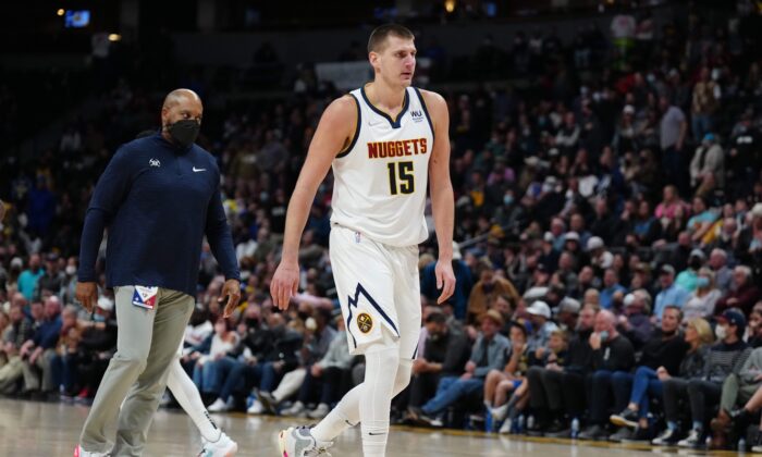 Denver Nuggets center Nikola Jokic (15) reacts after being ejected in the second half against the Washington Wizards at Ball Arena in Denver, on Dec. 13, 2021. (Ron Chenoy/USA TODAY Sports via Field Level Media)
