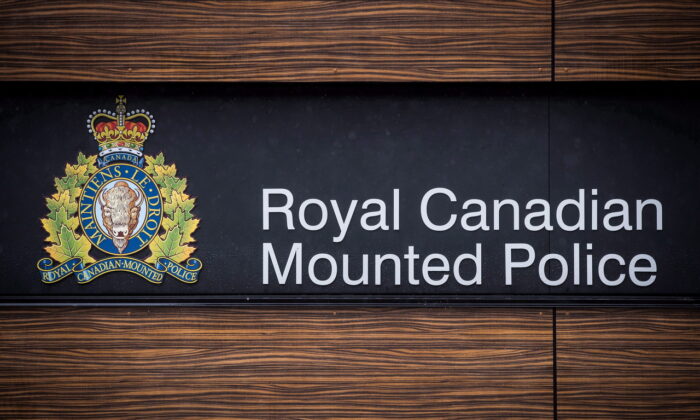 The RCMP logo is seen outside Royal Canadian Mounted Police "E" Division Headquarters, in Surrey, B.C., on April 13, 2018. (Darryl Dyck/The Canadian Press)