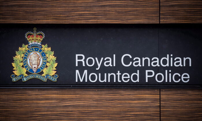  RCMP logo is seen outside Royal Canadian Mounted Police "E" Division Headquarters, in Surrey, B.C., on April 13, 2018. (Darryl Dyck/ Canadian Press)