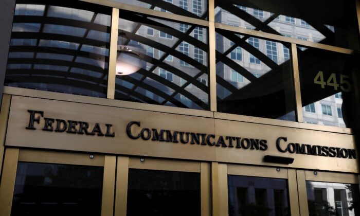 Signage is seen at the headquarters of the Federal Communications Commission in Wash., on Aug. 29, 2020. (Andrew Kelly/Reuters)