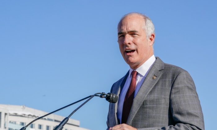 Sen. Bob Casey (D-Pa.) speaks at a rally and march on Nov. 16, 2021, in Washington. (Jemal Countess/Getty Images for SEIU)