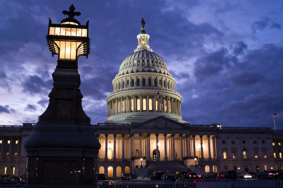 Night falls at the Capitol in Washington on Dec. 2, 2021. (J. Scott Applewhite/AP Photo)
