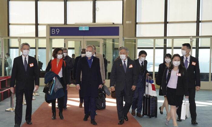 A group of French lawmakers arriving at the airport in Taoyuan, northern Taiwan, on Dec. 15, 2021. (Taiwan Ministry of Foreign Affairs via AP)