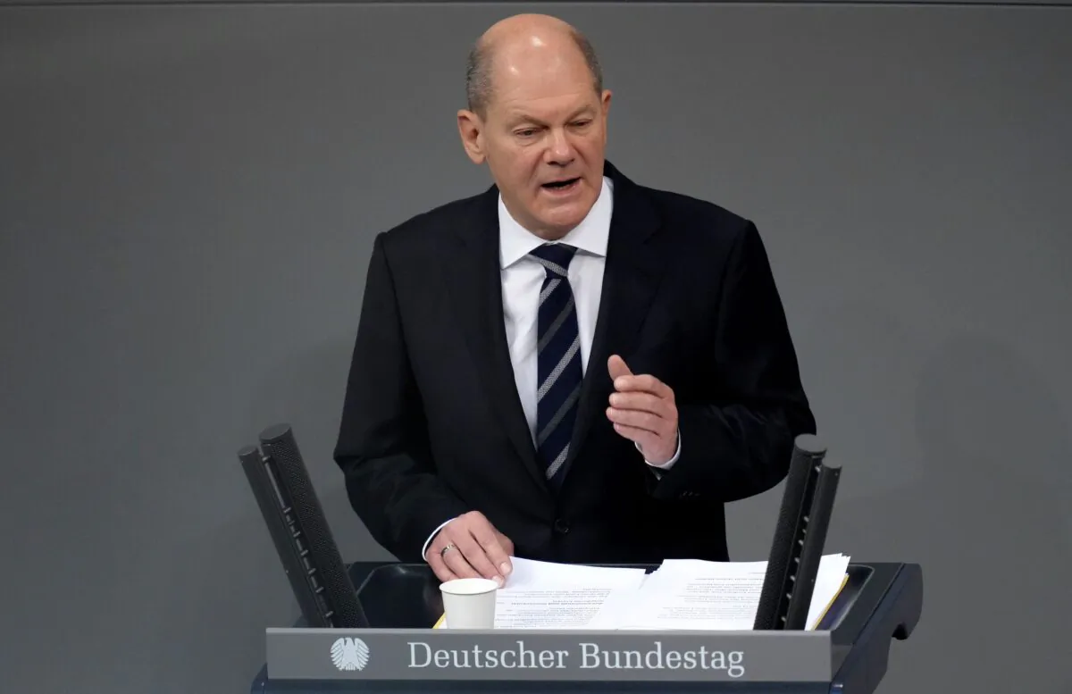 German Chancellor Olaf Scholz delivers a speech during a meeting of the German federal parliament, Bundestag, at the Reichstag building in Berlin, on Dec. 15, 2021. (Michael Sohn/AP Photo)