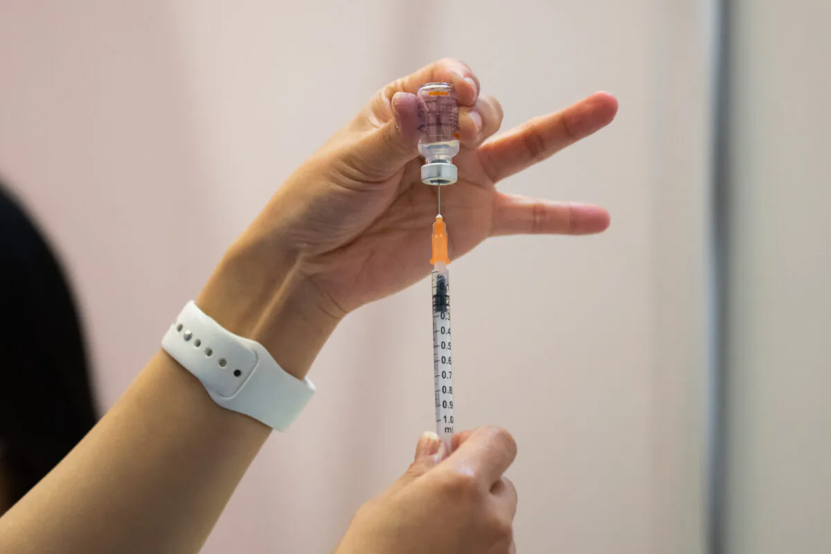 A nurse fills a syringe with a dose of the Sinovac COVID-19 vaccine at a community vaccination center in Hong Kong, on Feb. 26, 2021. (Billy H.C. Kwok/Getty Images)